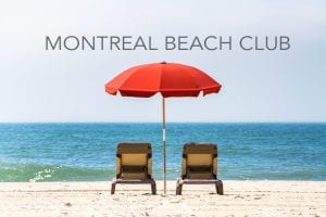 Montreal Beach Club link with two chairs and a red umbrella facing the ocean