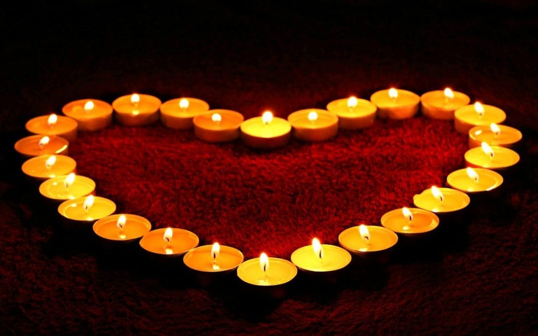 Picture of candles shaped like heart.