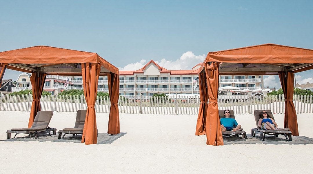 Beach cabanas in front of Montreal Beach Resort, Cape May New Jersey