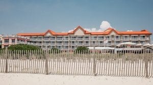 Exterior image showing the front of Montreal Beach Resort in summer. Cape May, NJ hotel.